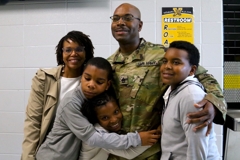 Army Sgt. surprises children after three-month deployment